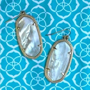 Kendra Scott Elle Mother of Pearl gold drop earrings.